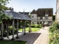 Arrières des Dominicaines&herbe&colombage&lavoir&buisson&fenetre