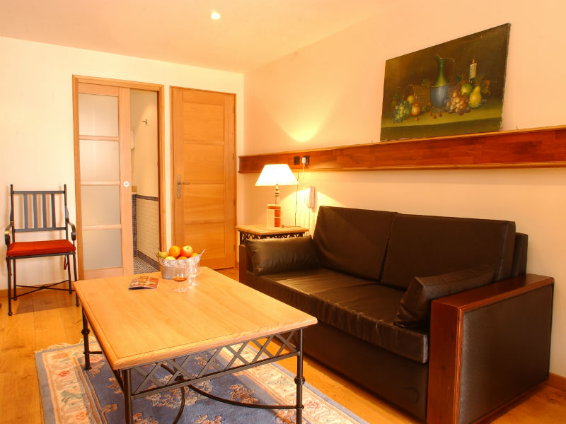 Salon de la chambre duplex - ©Lion d'Or Pont l'Evêque Salon de la chambre duplex - ©Lion d'Or Pont l'Evêque