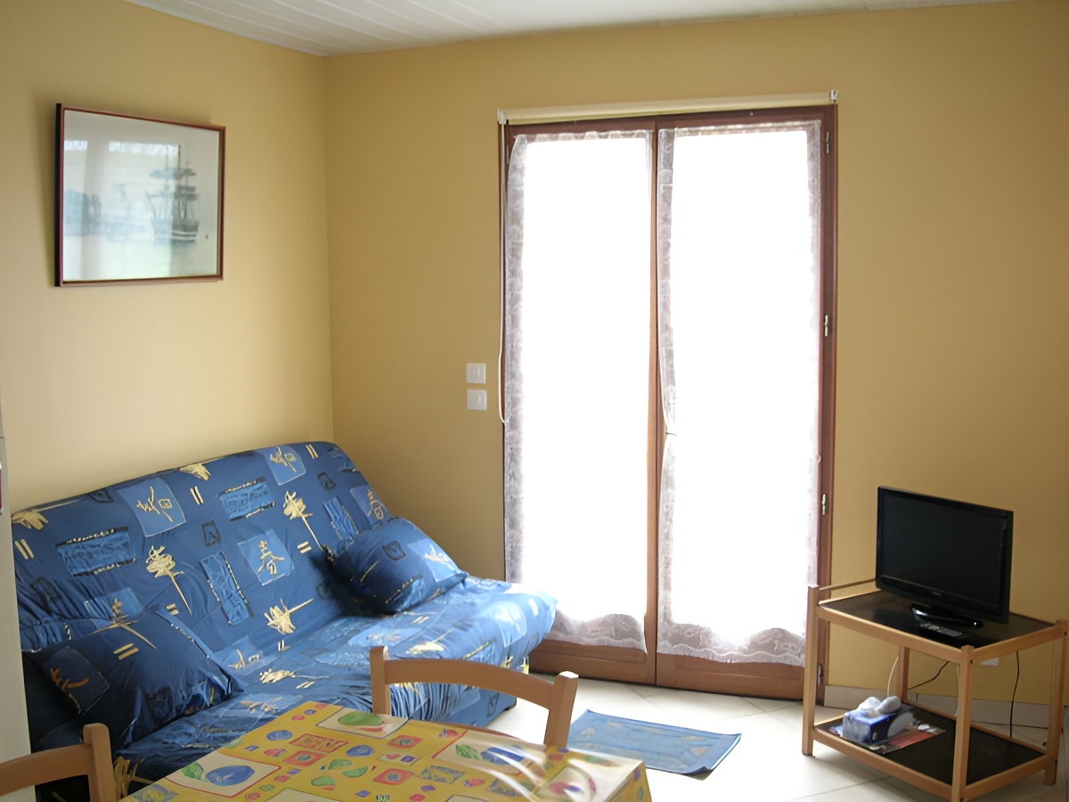 Appartement à Sainte Honorine des Pertes, coin salon - ©M. Rousseville - Clévacances Appartement à Sainte Honorine des Pertes, coin salon - ©M. Rousseville - Clévacances