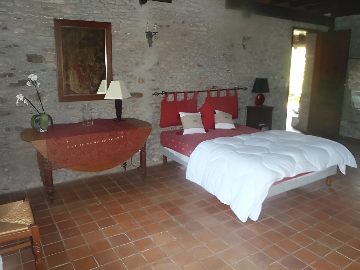Gîte de la Maison Bocaine à Campandré Valcongrain, chambre - ©Mme Belmonte - Clévacances Gîte de la Maison Bocaine à Campandré Valcongrain, chambre - ©Mme Belmonte - Clévacances