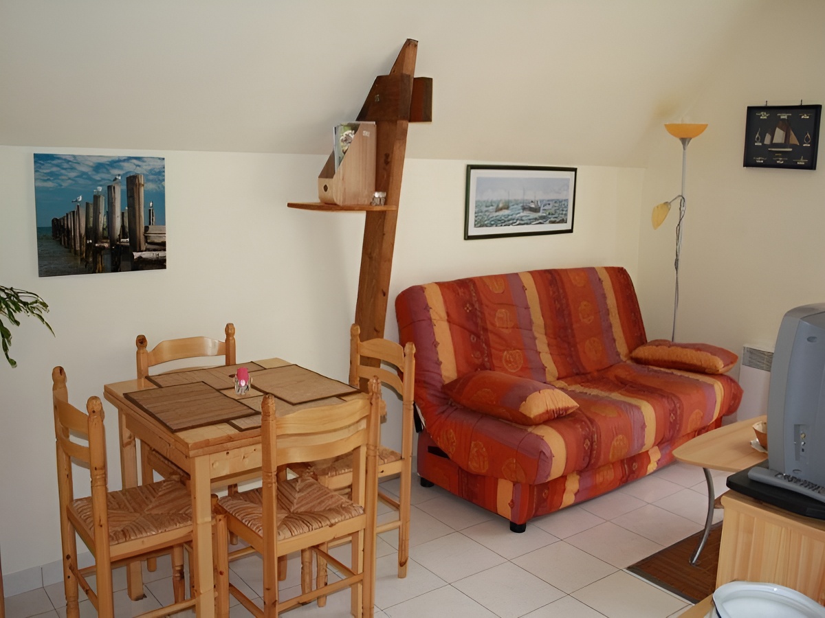 Appartement à Arromanches, salon - ©Mme Cuvigny - Clévacances Calvados Appartement à Arromanches, salon - ©Mme Cuvigny - Clévacances Calvados