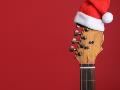 guitar-with-santa-hat-red-background-space-text-christmas-music-concept-350x260